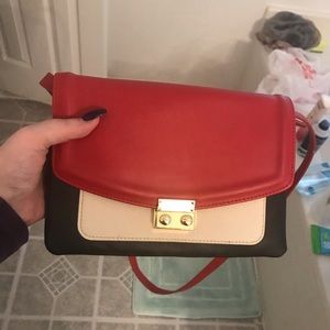 Black, white and red bag